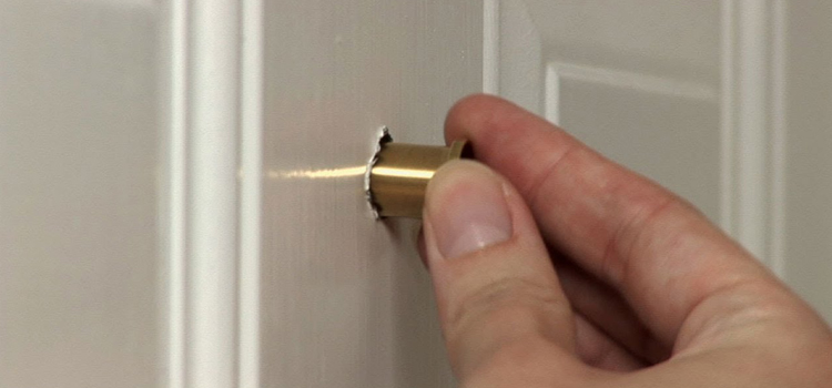 peephole door repair in Ives Estates